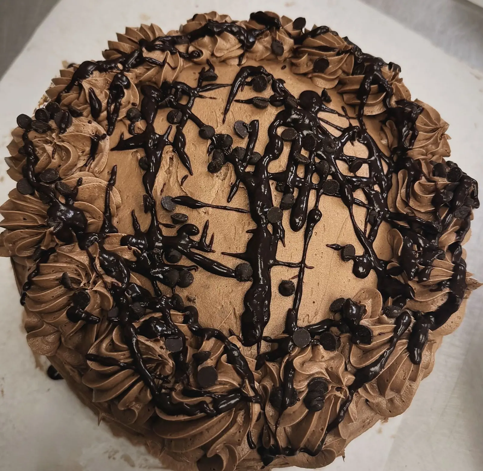 Chocolate layer cake with piped frosting