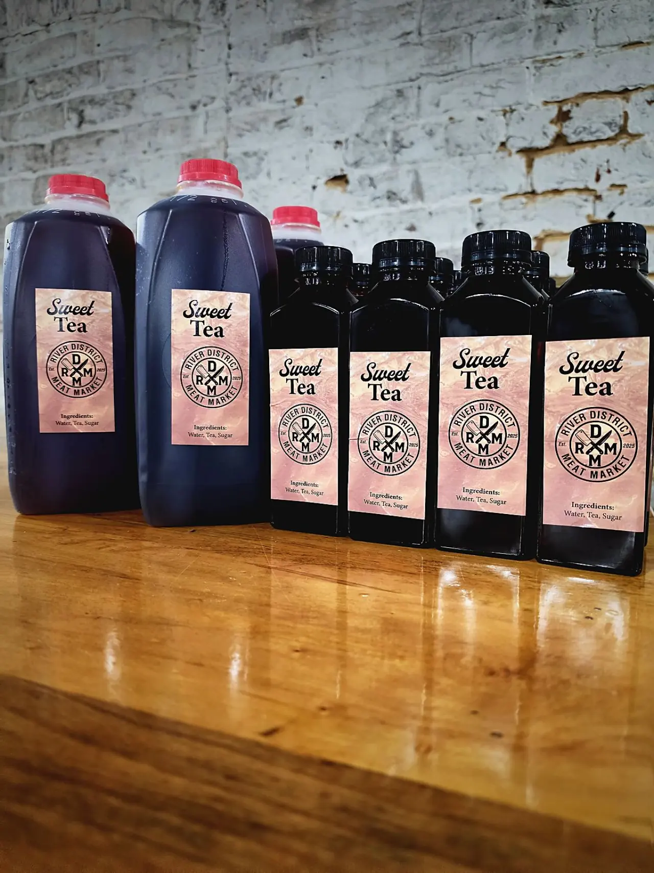 Bottles of house-label sweet tea on the counter